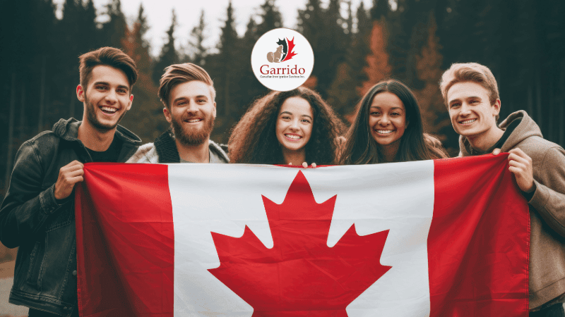 Express Entry Canada July 2025 Blog Young adults celebrating with the Canadian flag, representing newcomers exploring Express Entry pathways to permanent residence in Canada.